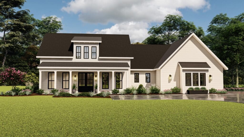 A modern farmhouse with white siding, black trim, large windows, and a manicured lawn under a partly cloudy sky.