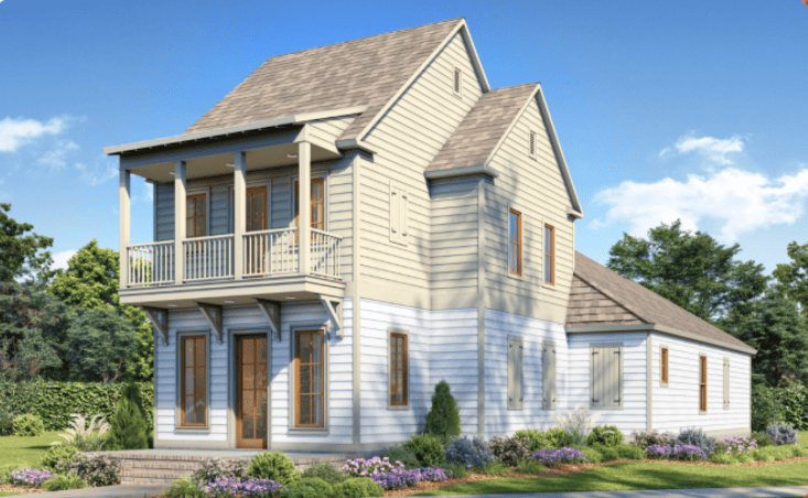 Two-story beige house with a front porch, upper balcony, and landscaped yard, under a clear blue sky.